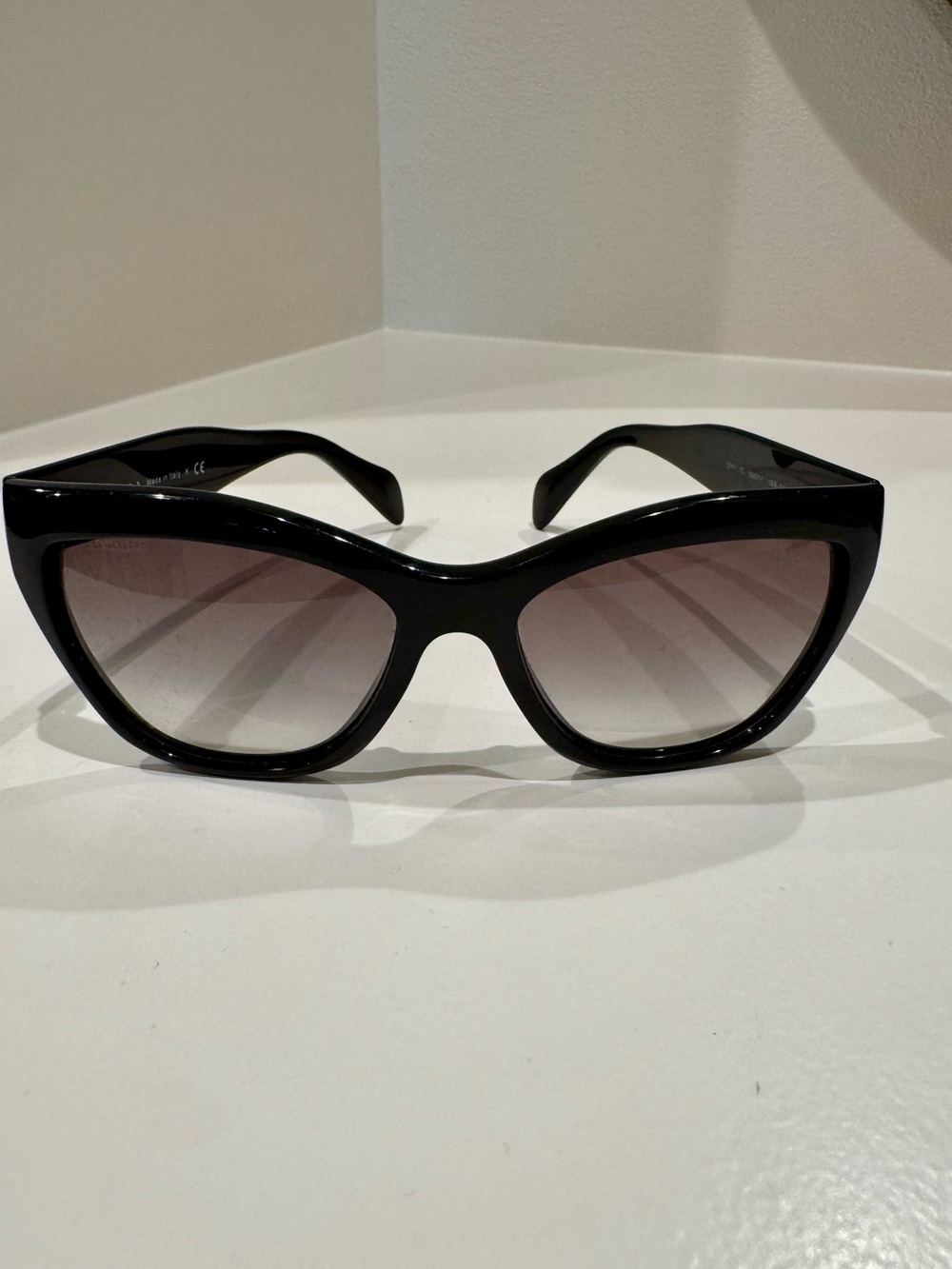 Prada Black Cat-Eye Sunglasses with Gradient Lenses
